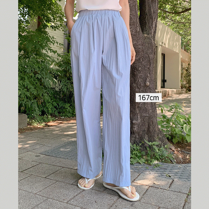 口袋寬鬆坑條休閒長褲
