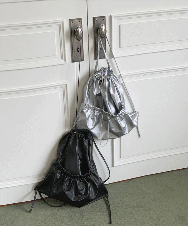 Melchior Glow String Backpack 肩背包