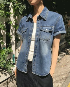 Curved side pocket Faded denim shirt