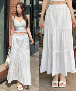 Low-waisted summer white cancan maxi long skirt with rustling nylon tiered low-rise skirt and banded flare.