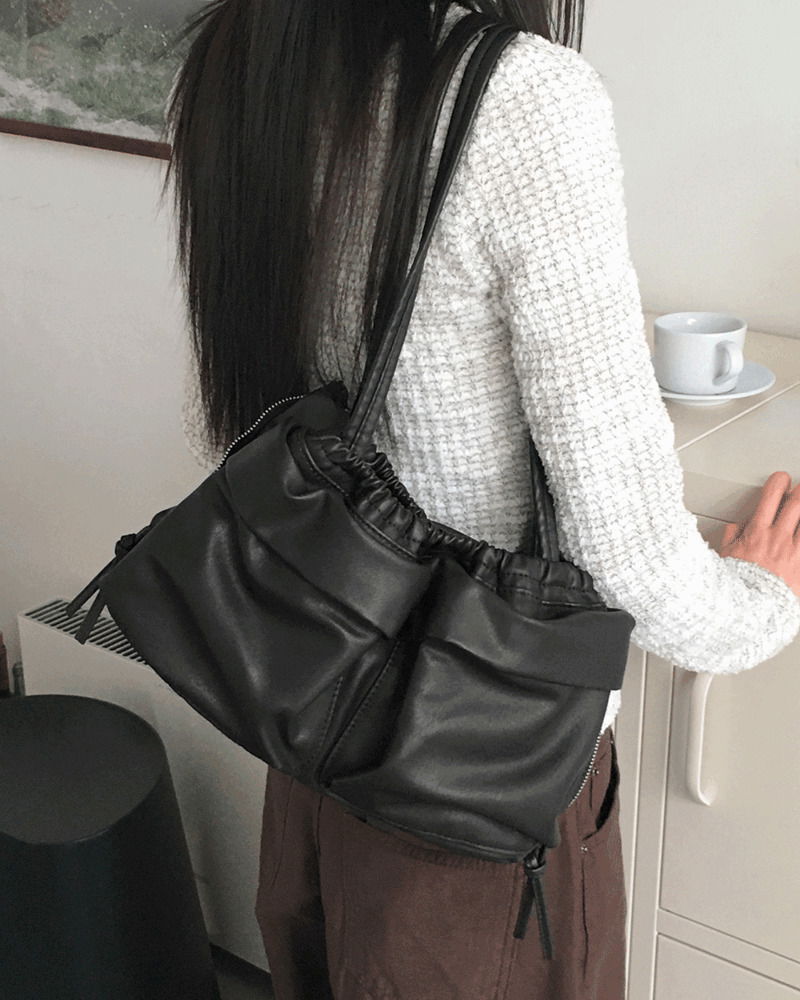 皮革口袋側拉鍊單肩包