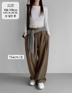 Suseonop 312 banded wool pin tuck pants