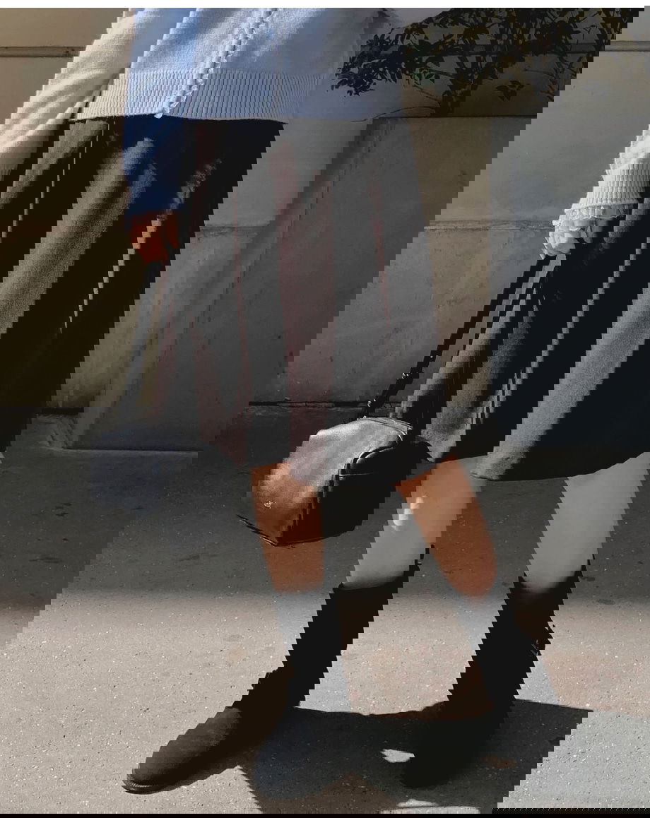 리리앤코 리엔이즈 핀턱 미디 스커트