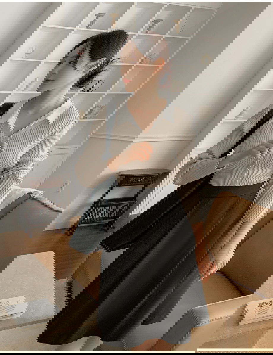 리리앤코 리엔이즈 핀턱 미디 스커트