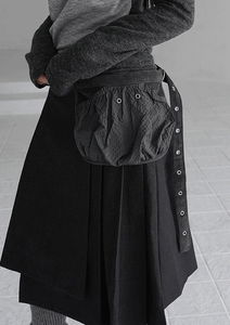 交叉肩帶背心套裝配側背包