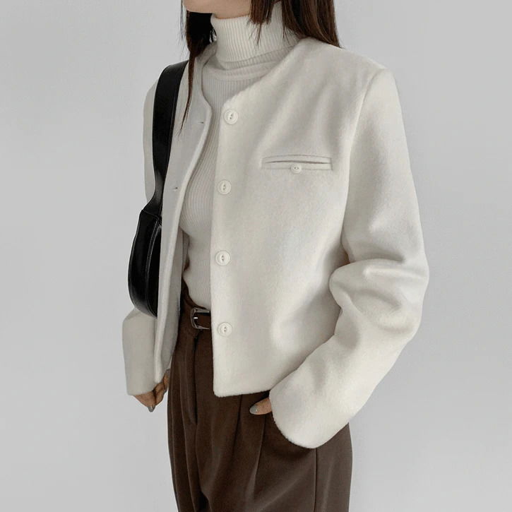 Button-up pocket cropped round jacket