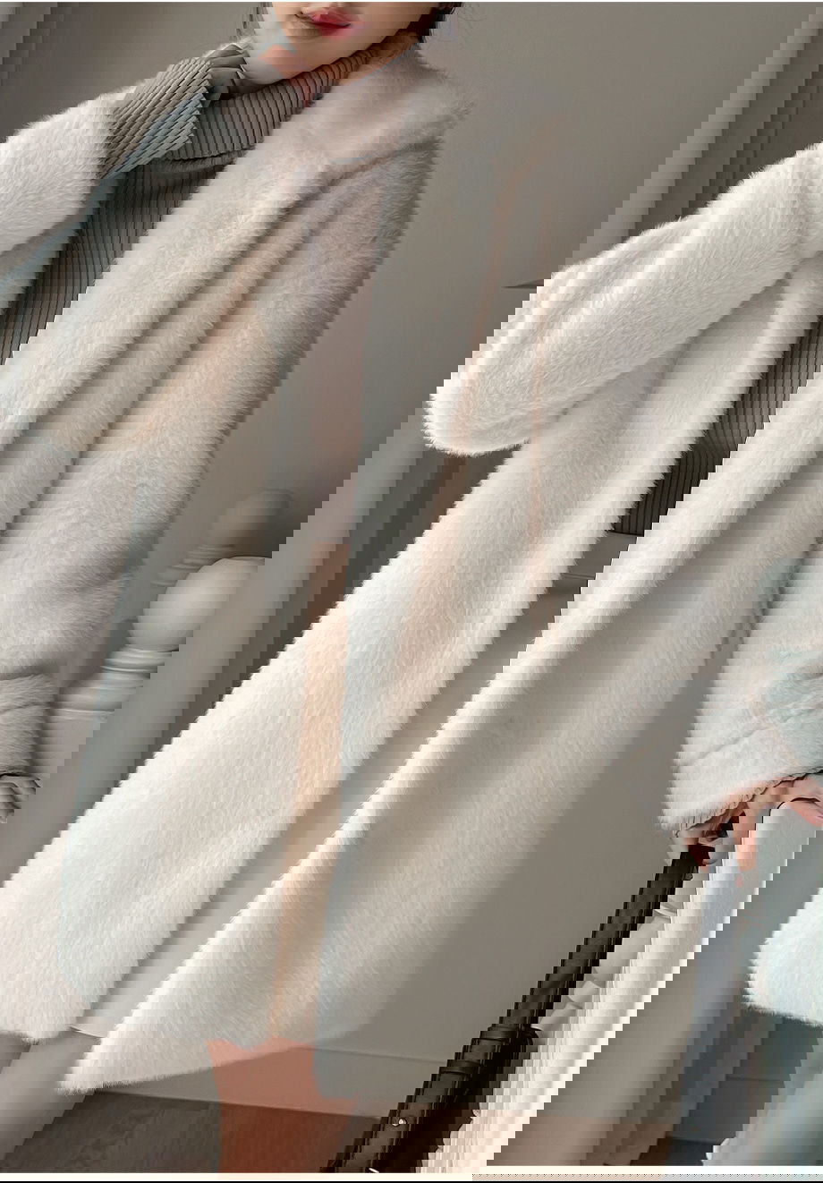 리리앤코 에포린즈 히든버튼 하이넥 퍼 자켓