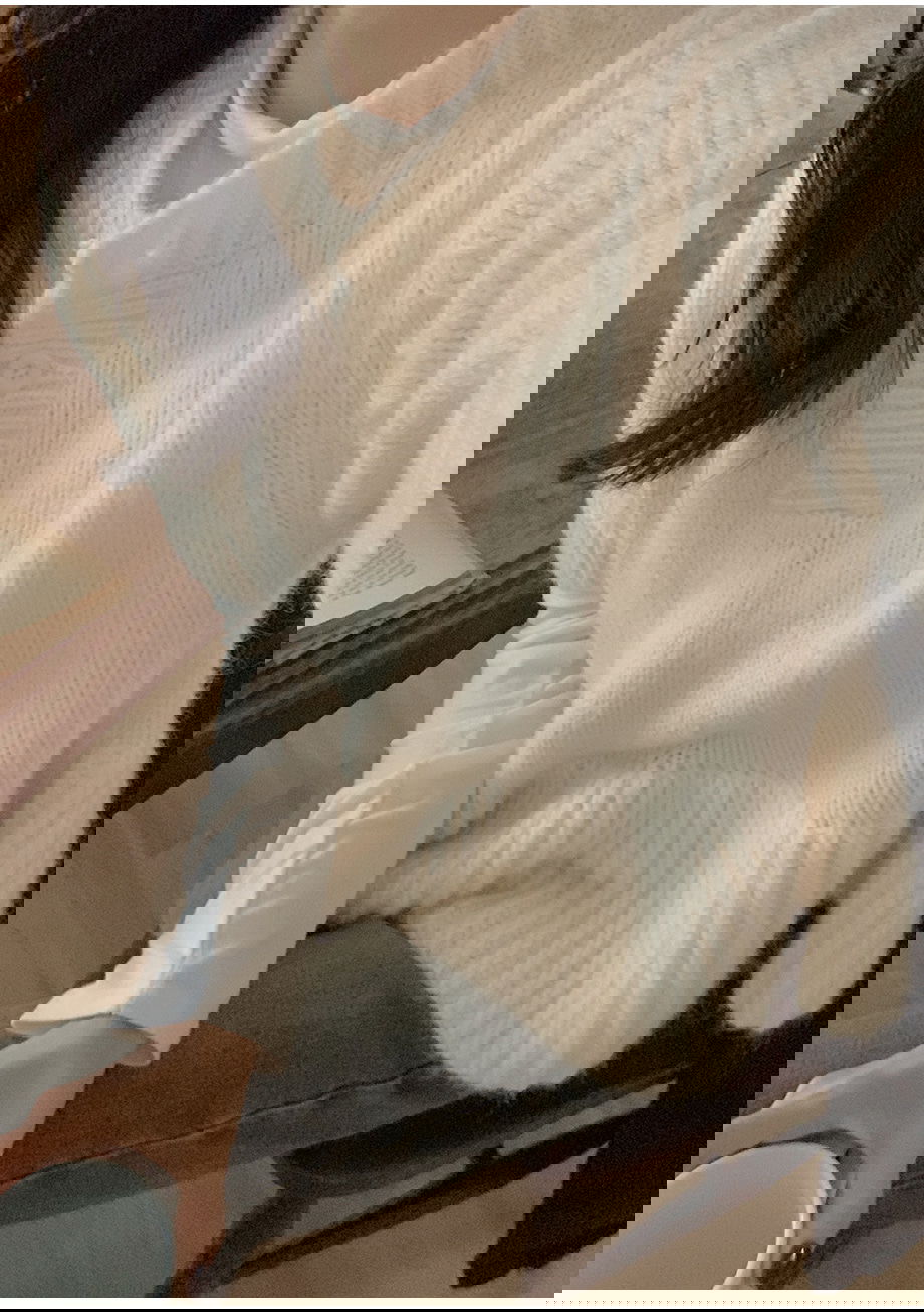 리리앤코 벨로테린 페플럼 버튼 루즈핏 반팔 니트