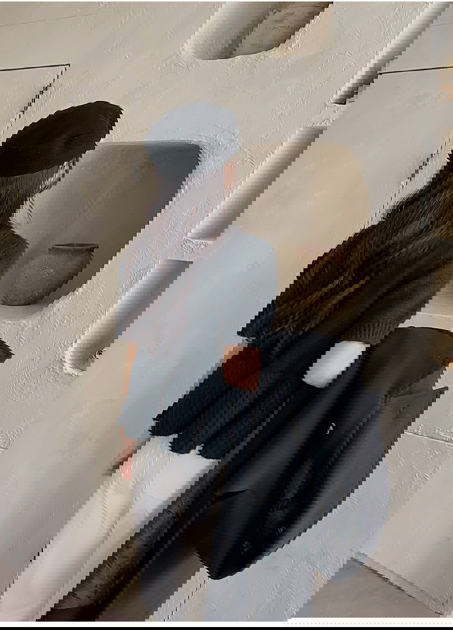 리리앤코 벨로테린 페플럼 버튼 루즈핏 반팔 니트