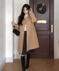 This classic coat (embroidered with a star, wedding guest look)