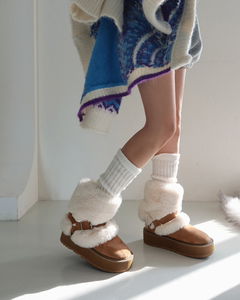Cowhide full-heel fur trimmed ugg boots