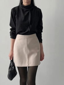 Suede high-neck tie blouse