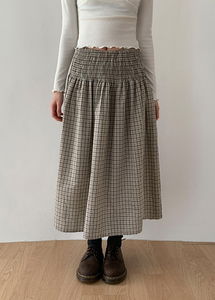Smoked banding check long skirt