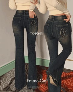 低腰後背刺繡設計黑色牛仔長褲